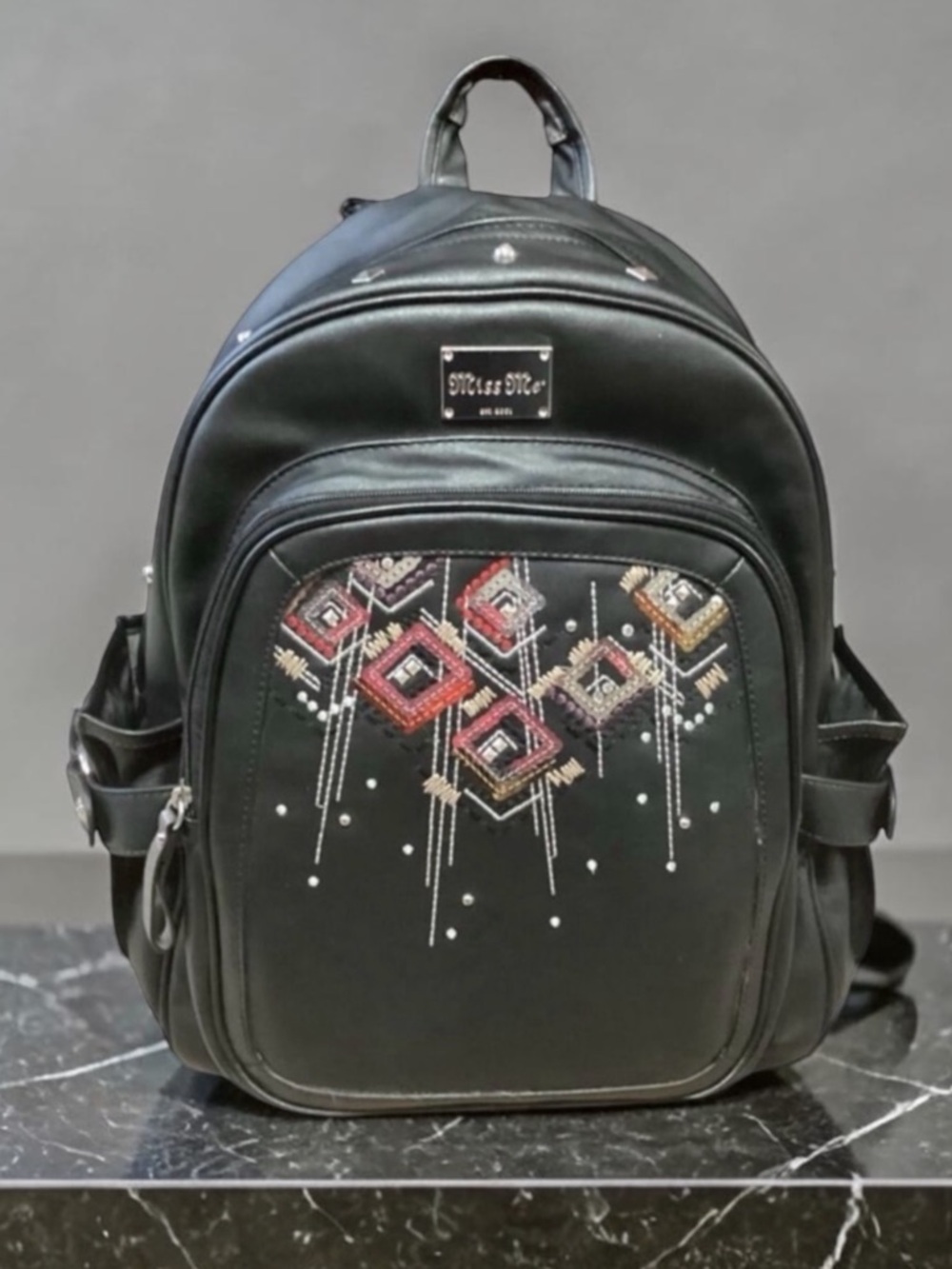 Miss Me Heather Ikat Embroidered Sequin Studded Black Faux Leather Backpack